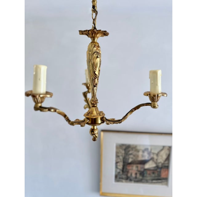 Louis XV Cast Brass Three-Light Chandelier, France, 1940s, in Very Good conditions. Designed 1920 to 1949 Up to 250V...