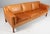 Børge Mogensen three-seat sofa with original patinated tan leather upholstery. Legs of teak. Model 2213, made by...