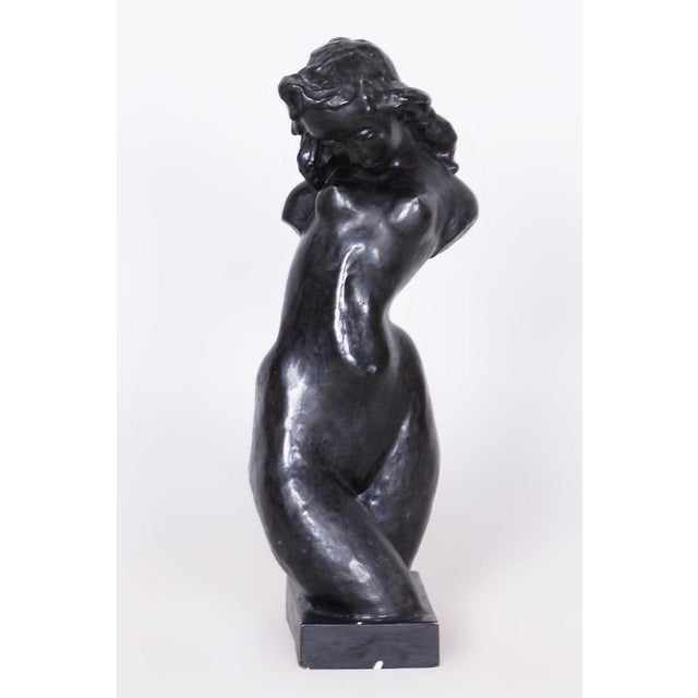 This charming figurine of a girl torso is an authentic representative of Czechoslovak Art Deco from the 1920s. It is the...