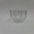 Decorative, clear glass bowl with undulating motif. Signed.