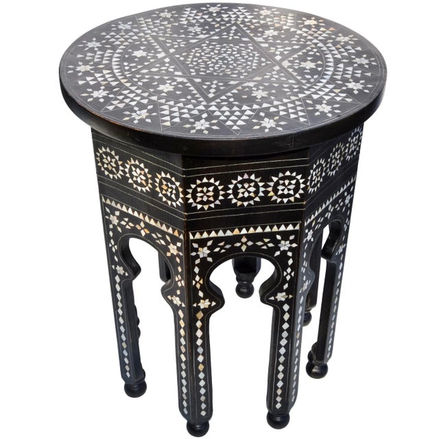 Superb vintage handcrafted Moroccan heavy and sturdy side table, featuring an intricate hand-carved and beveled solid...