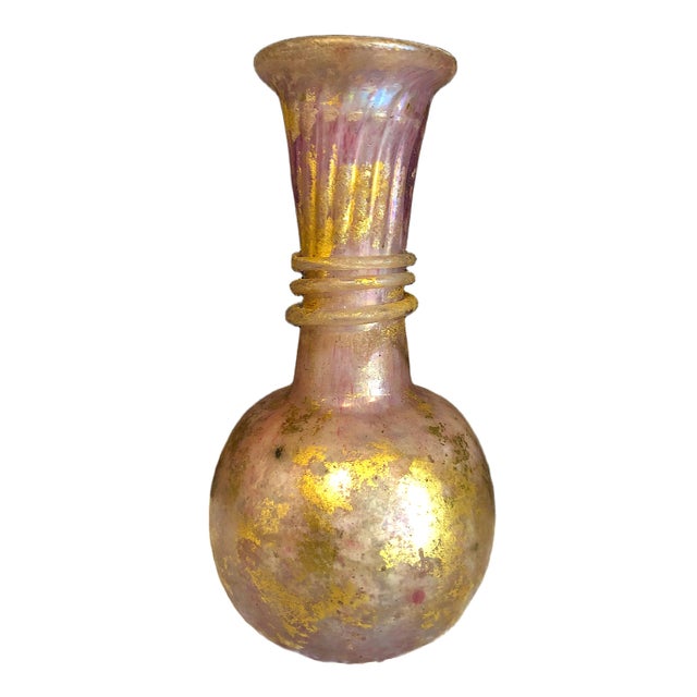 On offer is an art glass ewer, a vessel with a handle and a flared neck. It features design elements reminiscent of...