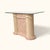 Postmodern console table from the 1980s with a rectangular glass top, tessellated stone base, and rounded textured column...