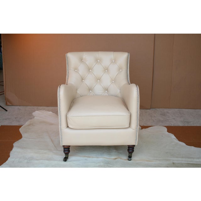 handcrafted by skilled master workers. Upholstered with genuine leather all around with no leather match at all, and solid...