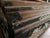 Antique Steamer Trunk Dome Top Embossed Metal Finish With Wheels For Sale - Image 4 of 10