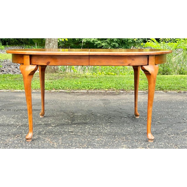 Classic country Queen Anne extension dining table in pine hand crafted by the master cabinet makers at Habersham. Known...