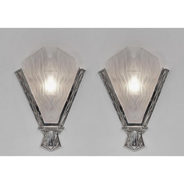 Degué A large and very rare pair of authentic 1930 French art deco wall sconces in nickel plated solid brass or bronze...
