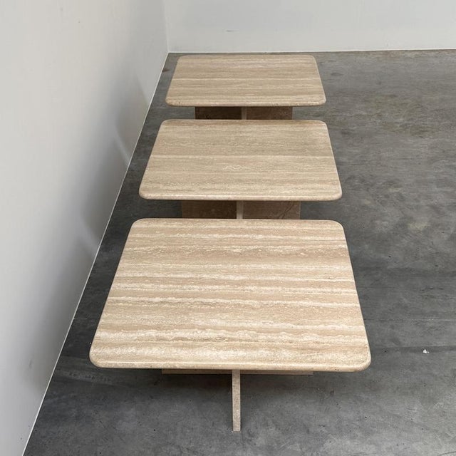 Width: 60 centimeters Height: 40 centimeters Depth: 60 centimeters Beautiful set of three vintage travertine tables,...