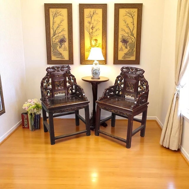 This pair stunning antique Chinese grand master (Taishi) armchair features intricate carvings that showcase the skill and...