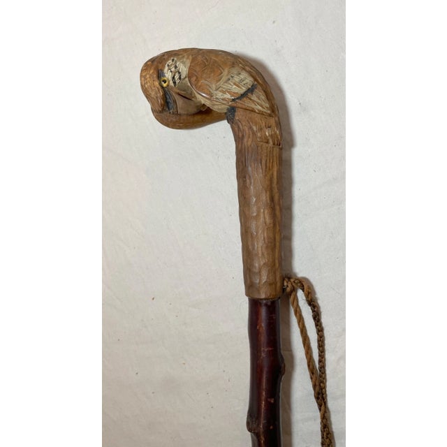 Up for sale is a nice quality antique hand carved German wood figural bird cane. The bird handle is carved with intricate...