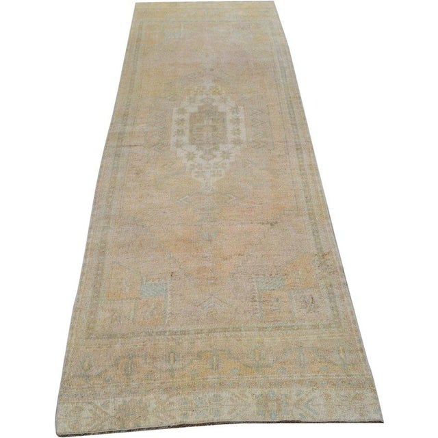 Hand-knotted with care using traditional rug-making techniques, this wool rug blends timeless craftsmanship with a modern...