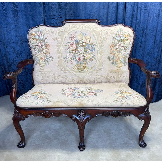 Queen Anne Style Needlepoint Settee – A Tapestry of Elegance and Heritage Celebrate the artistry of classic English design...