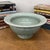 "About This Piece About This Piece This striking celadon bowl radiates refinement through its intricate web of fine...