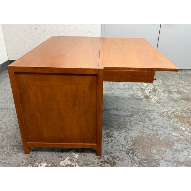 Design Plus Gallery presents a Bespoke Mid-Century Modern Fold Down Desk. This convertible desk has a drop-leaf extension...