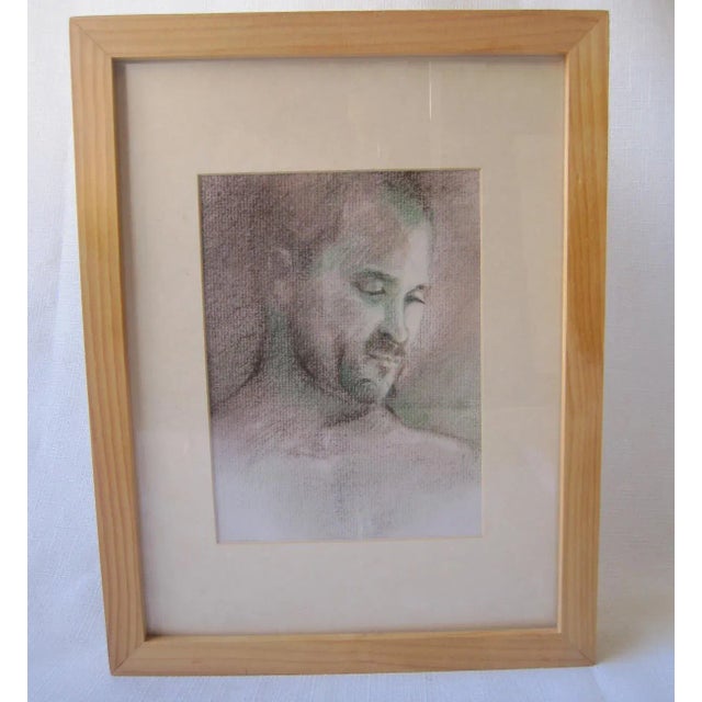 Pastel portrait/study of a man framed in a blonde wood shadowbox framed. The outer edges measures 13"H x 10.25'W x 1.5"D....