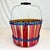 This is a gorgeous Orchard Gathering Basket. It’s crafted from slats of Maple wood with a deep red navy stain. The word...