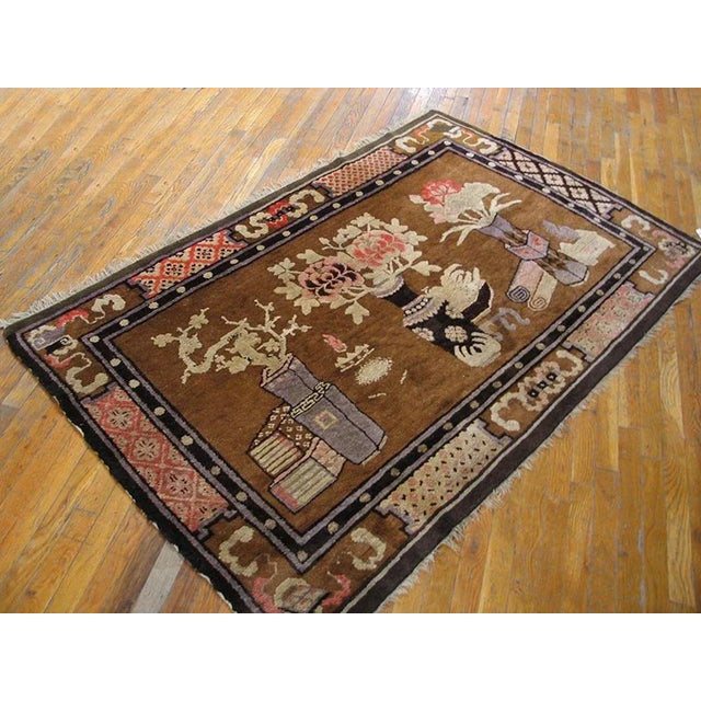 Antique Chinese Bao Tou rug, size: 4' 2'' x 6' 6''. Antique Baotou Small Scatter Size Wool Brown Rug, Circa Date: 1920s....