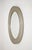 Narciso round wall mirror, designed by Sergio Mazza for Artemide in the 1960s. This piece is an icon of modernist and...