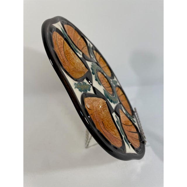 A beautiful hand painted French Faience Oyster Plate made by the French pottery workshop of Saint Jean de Bretagne in...