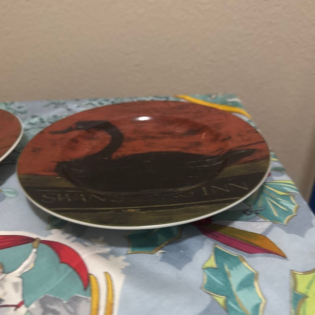 Enhance your folk art collection or rustic table setting with this charming pair of vintage decorative plates from the...