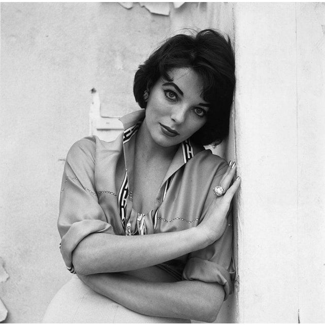 Joan Collins circa 1965: Portrait of British actor Joan Collins leaning against a wall. (Photo by Hulton Archive/Getty...