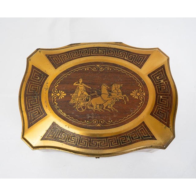 Description: Antique jewelry box made of fine exotic wood with gilded bronze inlays featuring a neoclassical motif. The...