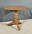 Cherry wood pedestal table with a warm color and a glossy finish highlighting its antique character. Recognized for its...