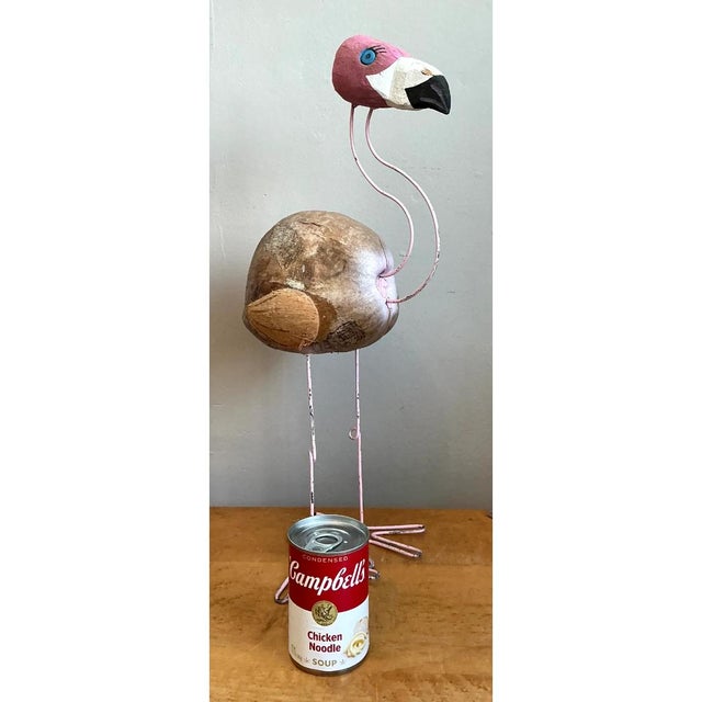 This vintage flamingo sculpture is a whimsical piece of folk art, built from a real coconut shell and slender painted...