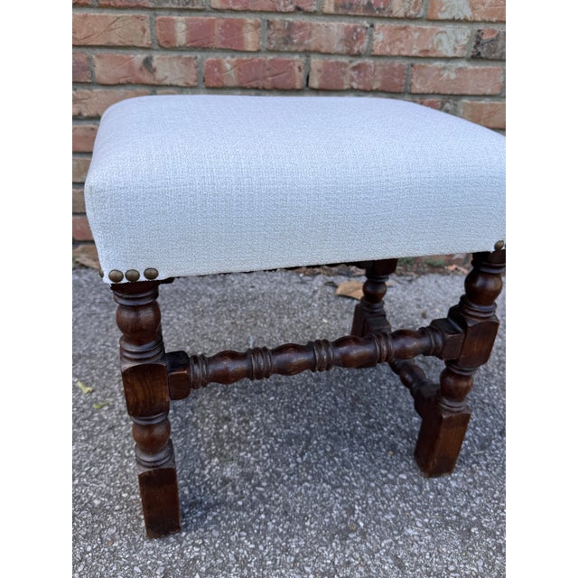 Lovely English Jacobean stool with new fabric and padding. The antique frame is 19th century and fabric is vintage white...