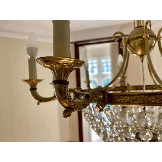 10-light chandelier in bronze and cut crystal, work from the 1960s - H=1m66, Diam=85cm. Up to 250V (Europe/UK...