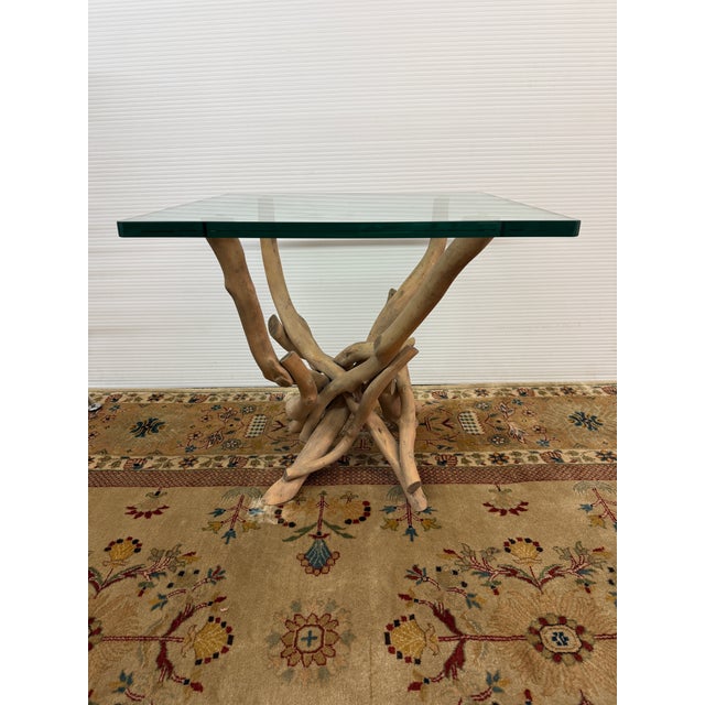 Design Plus Gallery presents a Gathered Driftwood Side Table. The style borders on rustic, coastal and in that easy going...