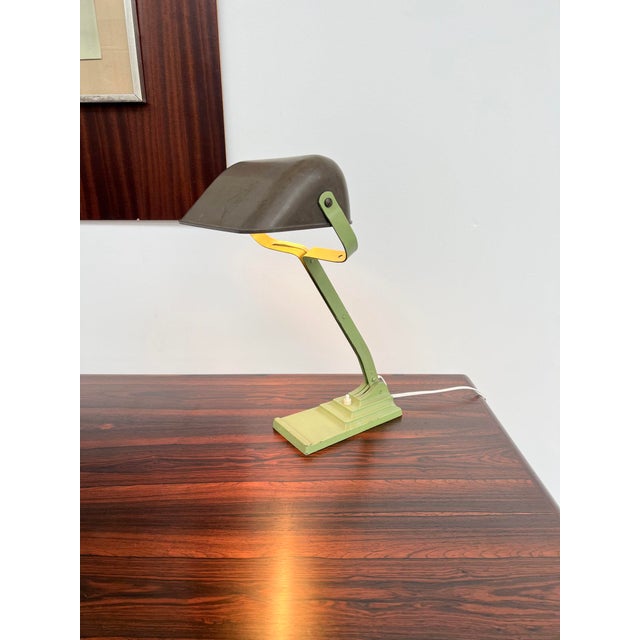 Erpe articulated desk lamp (brussels, founded 1914) — pantograph arm with multiple joints, a graphic silhouette of belgian...
