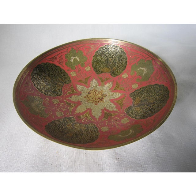 Gorgeous Large vintage Indian Metal Peacock Bowl. It measures 10"D x 3"H and is in excellent condition.