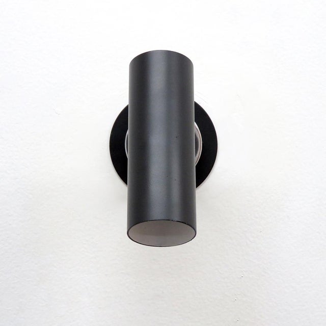 Wonderful minimalist wall lights model 31B designed by Gino Sarfatti, manufactured by Arteluce, Italy 1950 with black...