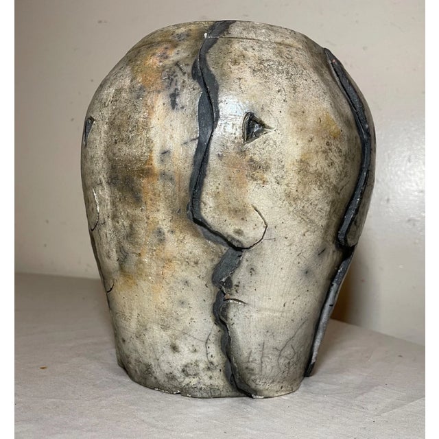 This exquisite antique handmade vase by D.J. is a beautiful addition to any home decor collection. The unique figural...