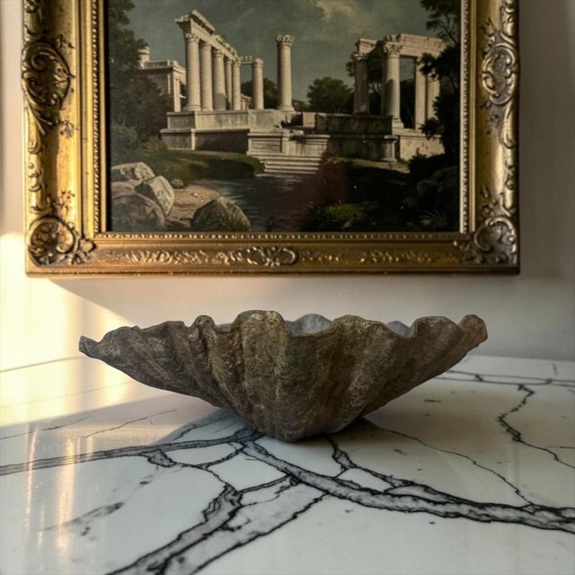 An exceptionally substantial vintage cast bronze clamshell bowl, beautifully modeled after the organic contours of a...