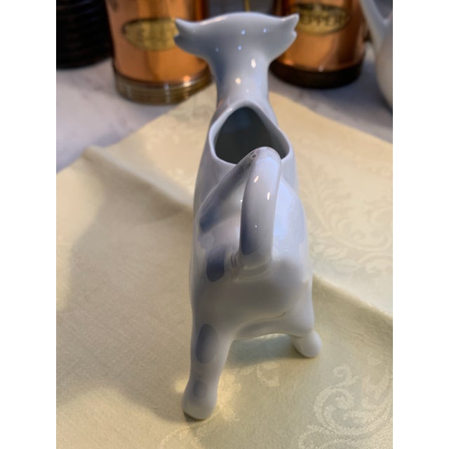 Here we have Bessie The Cow, she's a vintage white porcelain figural creamer made in France. Bessie sez creamer cartons...