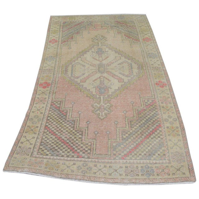 Hand-knotted with care using traditional rug-making techniques, this wool rug blends timeless craftsmanship with a modern...