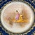 Truly an amazing find! Intricately handpainted Limoges cabinet plate in a background with a cobalt band encrusted with a...
