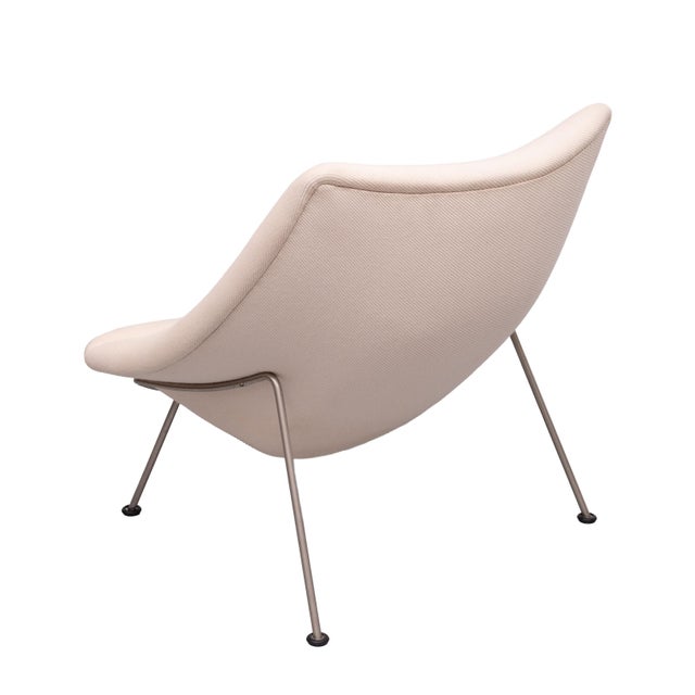 This is the iconic Artifort Oyster armchair by designer Pierre Paulin, distinguished by its elegant, organic shell shape...