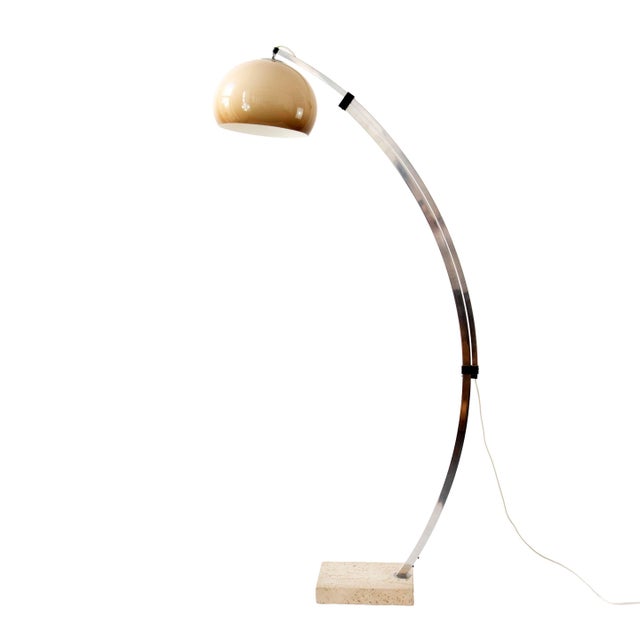 This large arc floor lamp from the 1970s combines a wide, sweeping chrome arc with a solid travertine base and a spherical...