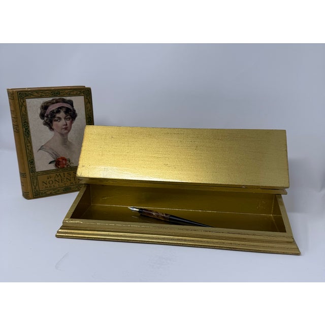 Vintage handcrafted Italian giltwood desk stationery and correspondence organizer, circa 1960s–1970s. Crafted of...