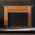 Vintage mid 20th century painted wooden mantel with decorative moulding. Off white paint. Opening dimensions:W:50" X H:37.5".