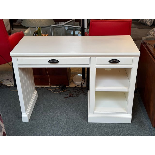 Design Plus Gallery presents the Aubrey Single Cabinet Writing Desk from Pottery Barn. The desk is styled with white bead-...