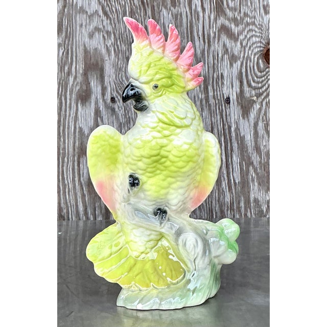 Add a vibrant splash of mid-century modern charm to your decor with this delightful glazed ceramic cockatoo vase....