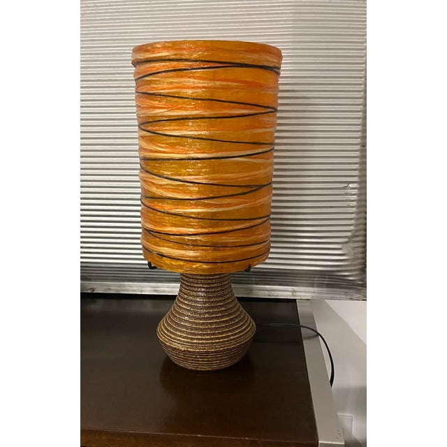 Shaded brown glazed ceramic lamp, signed under the base. Electricity checked by a professional in December 2024. Large...