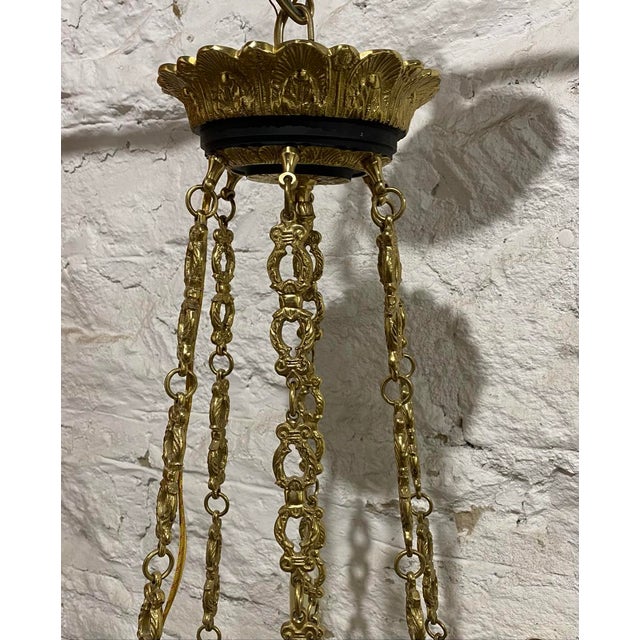 Width : 18” diameter Height: 29” 15” cahin Transport your home to a bygone era of grandeur with this exquisite antique-...