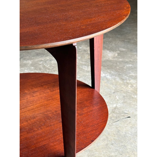 An elegant lamp or occasional table designed by Gio Ponti and produced by Singer and Sons. Table features quarter sawn...
