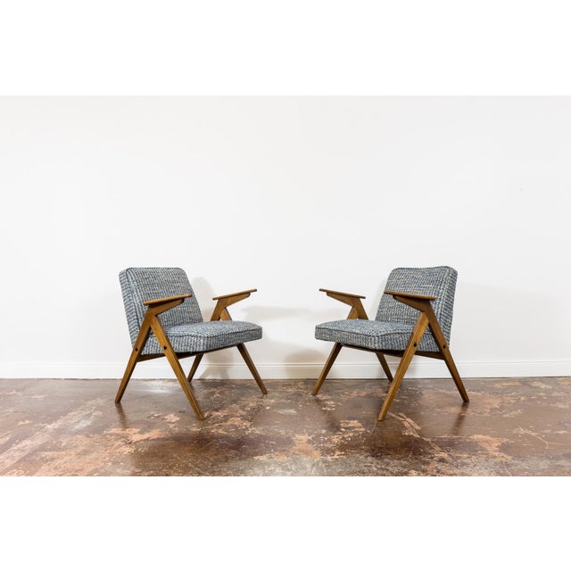 A set of 2 restored “Bunny” armchairs, model 300-177, produced by Dolnośląska Fabryka Mebli in Poland in the 1970s. The...