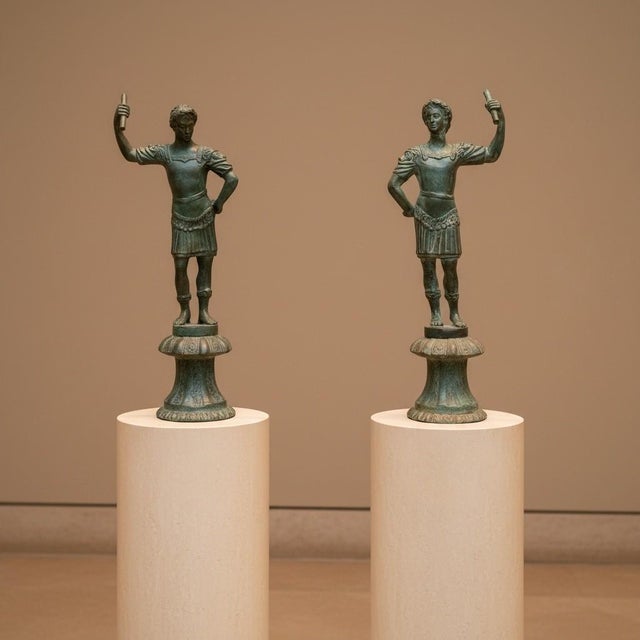Vintage Maitland-Smith bronze Roman-style figures, a matched pair handmade in Thailand, circa 1980s–1990s. Founded in...